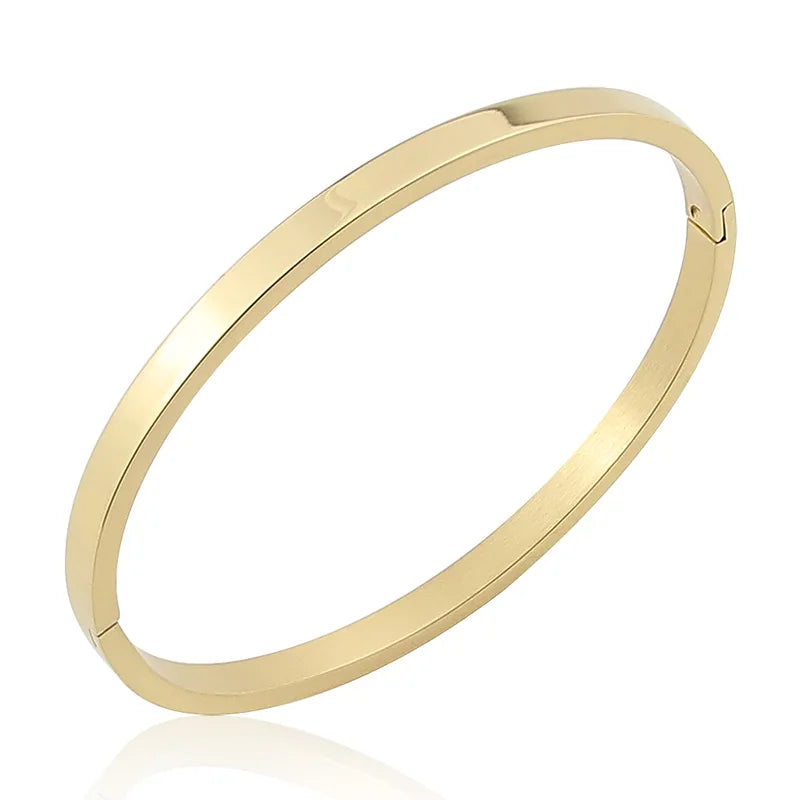 Bracelet jonc ovale tendance en acier inoxydable pour femme et enfant, bijou à breloques, cadeau idéal pour les fêtes, mariages et autres occasions spéciales. Vente en gros.