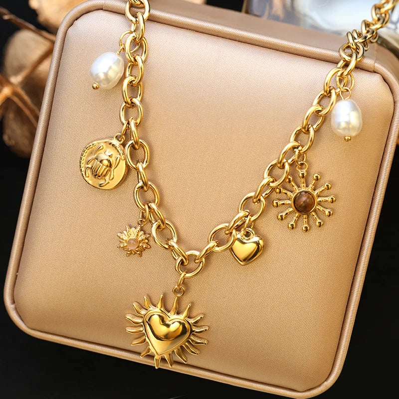 Collier pendentif tendance en acier inoxydable 316L, forme étoile de mer, lune et soleil, avec chaîne dorée. Bijou fantaisie à offrir.