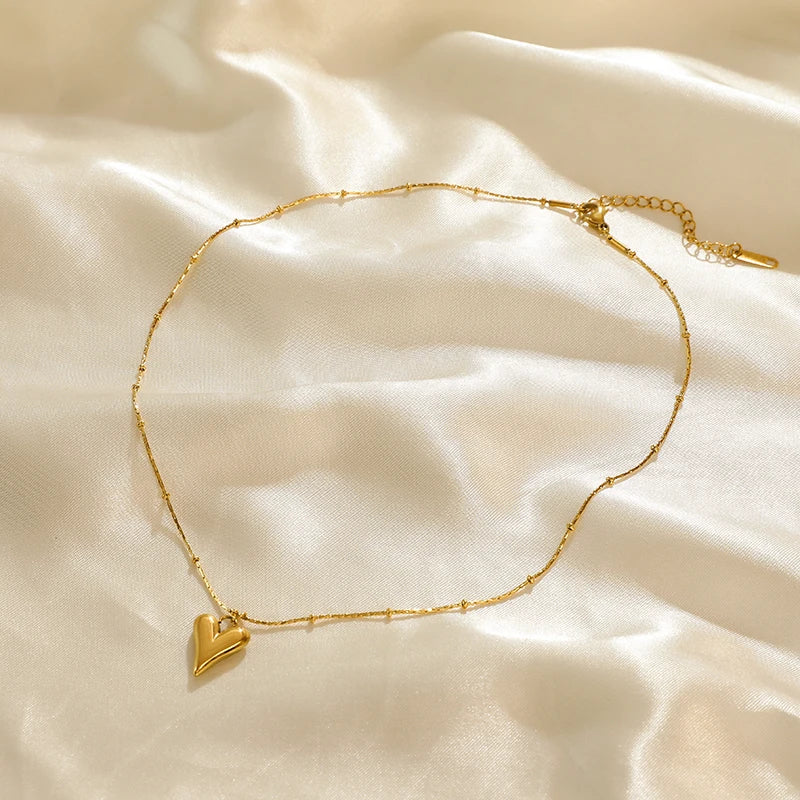 Collier ras du cou EILIECK en acier inoxydable 316L couleur or avec pendentif en perles creuses, inaltérable, idéal pour les cadeaux de fêtes.