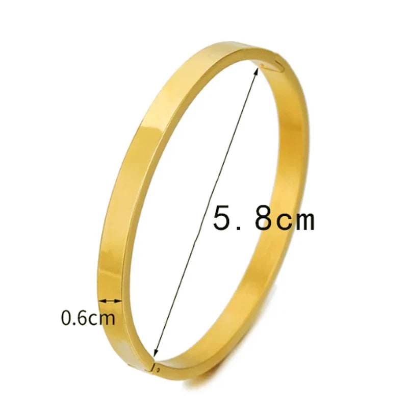 Bracelet jonc ovale tendance en acier inoxydable pour femme et enfant, bijou à breloques, cadeau idéal pour les fêtes, mariages et autres occasions spéciales. Vente en gros.