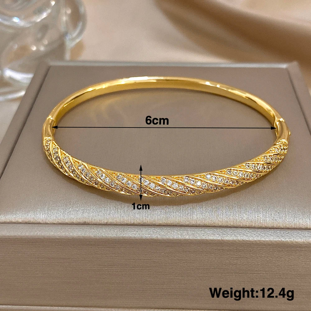 Bracelets manchettes torsadés de luxe en zircon micro-incrusté pour femmes, bijoux tendance en cuivre plaqué or, à offrir en cadeau