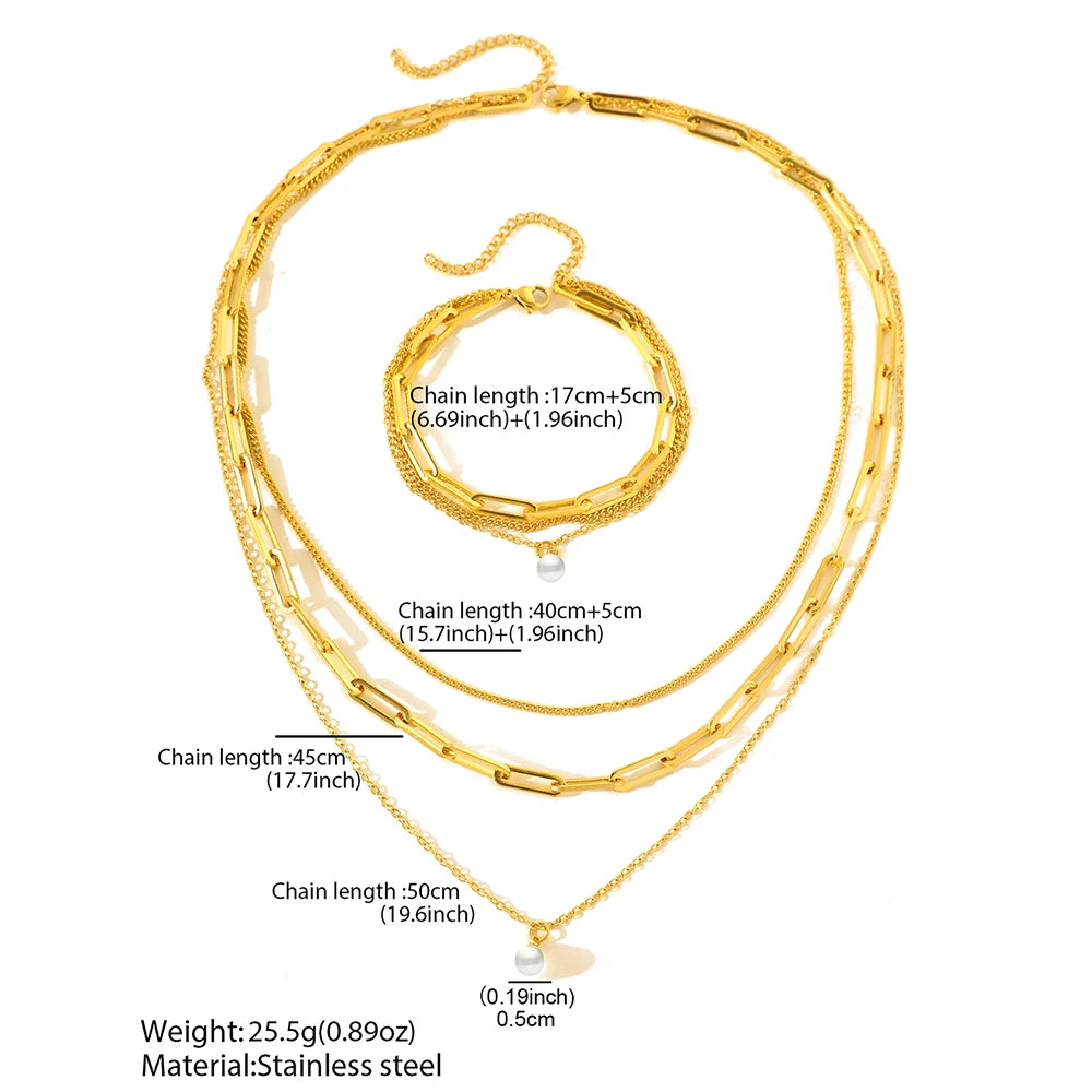 Ensemble de bijoux Aomogo en acier inoxydable, comprenant un pendentif en perle délicate et une chaîne multicouche de luxe pour femme.