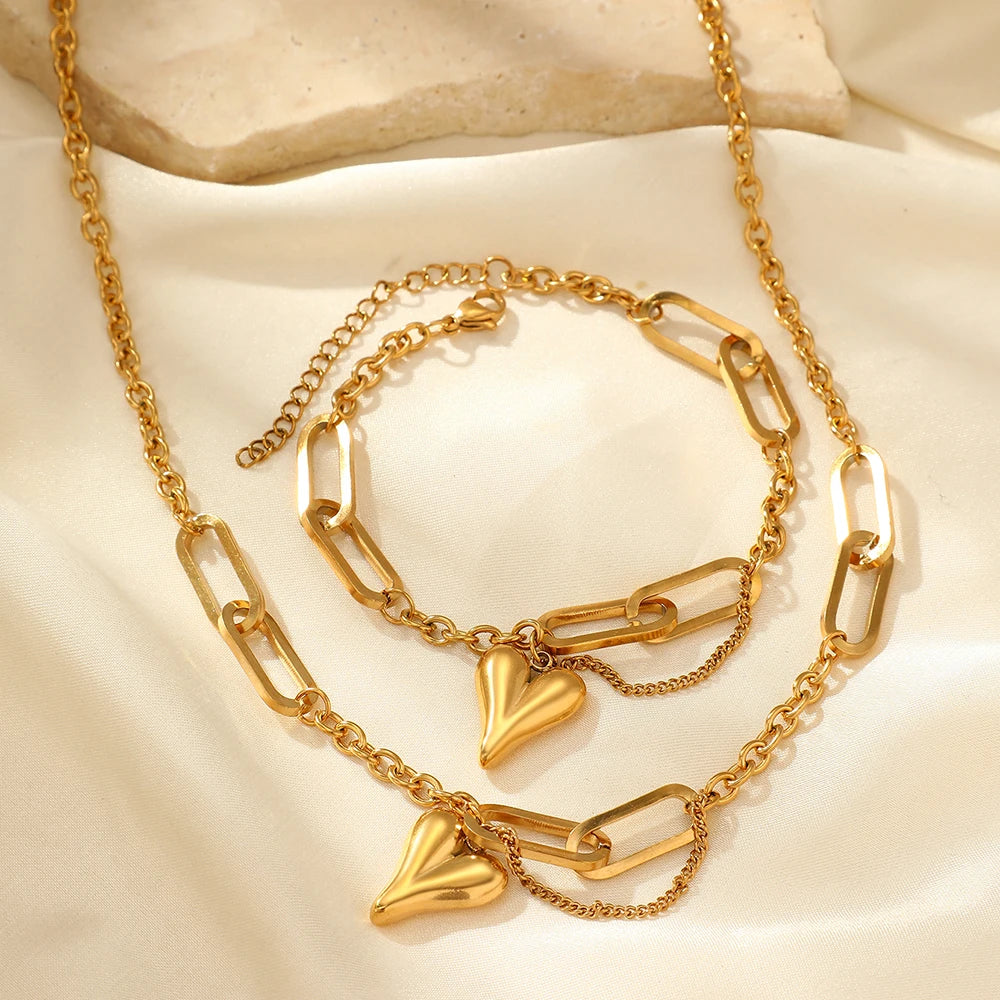 Ensemble de deux bijoux pour femme en acier inoxydable, combinant une chaîne irrégulière en forme de cœur, au style rétro et luxueux, à assortir au quotidien.
