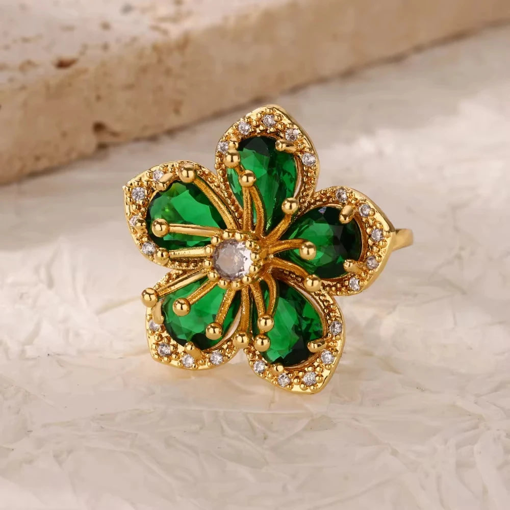 Bague de luxe en acier inoxydable avec zircon vert et fleur pour femme, style serpent, plaquée or, idéale pour un mariage ou une soirée. Bijou d'exception.