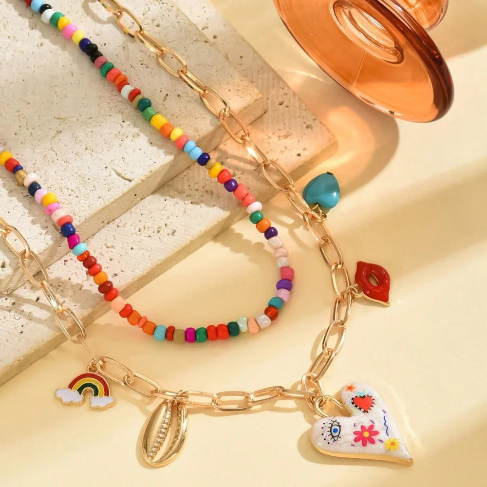 Collier bohème multicouche fait main avec perles et pompons, pendentif goutte d'huile colorée, bijou pour femme