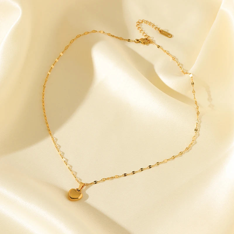 Ensemble collier, bracelets et boucles d'oreilles EILIECK en acier inoxydable 316L, motif cœur et plaqué or 18 carats, style tendance et étanche.