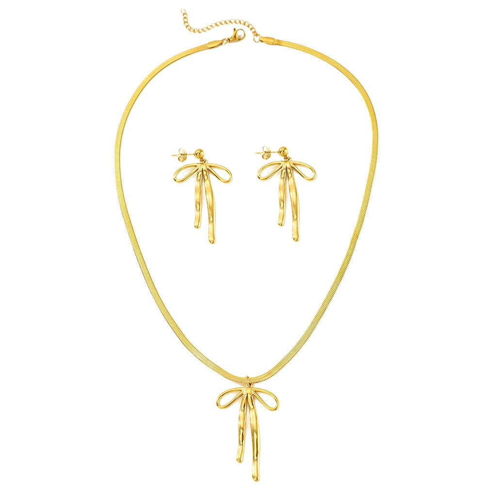 Ensemble Aomogo en acier inoxydable, luxueux et tendance, comprenant un pendentif nœud papillon, des boucles d'oreilles et un collier à chaîne en os de serpent. Bijou pour femme à porter au quotidien.