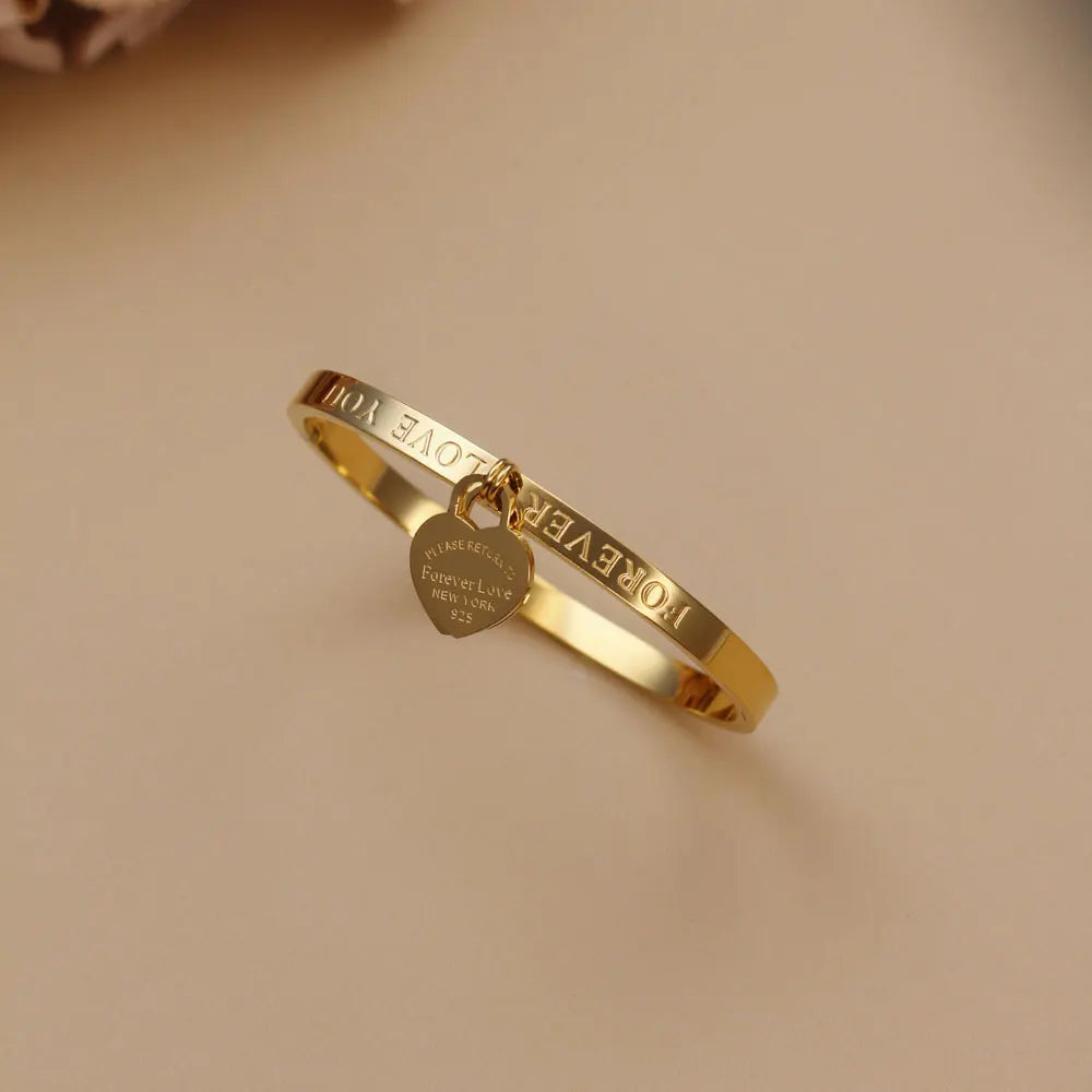 Bracelets et joncs classiques tendance en acier inoxydable doré Bracelet double cœur pêche