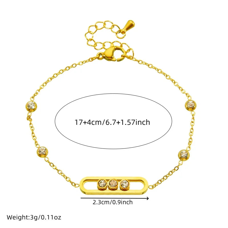 XIYANIKE Ensemble collier, bracelet et boucles d'oreilles en acier inoxydable 316L, forme rectangulaire arrondie, orné de cristaux blancs mobiles. Idée cadeau pour femme.