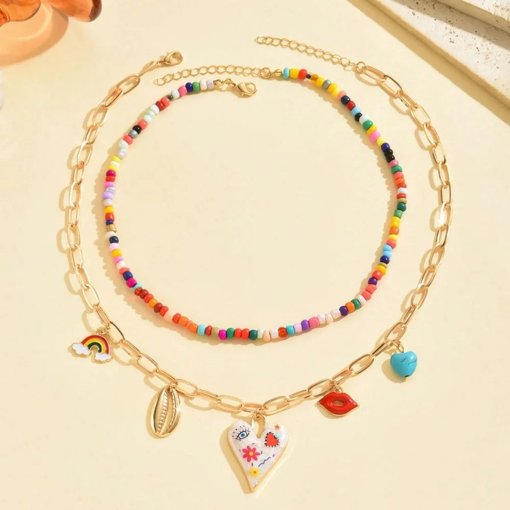 Collier bohème multicouche fait main avec perles et pompons, pendentif goutte d'huile colorée, bijou pour femme