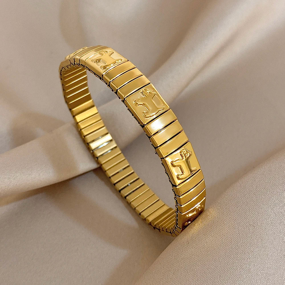 Bracelet vintage italien en acier inoxydable élastique à motif étoile, style jonc, ajustable, pour femmes et hommes.