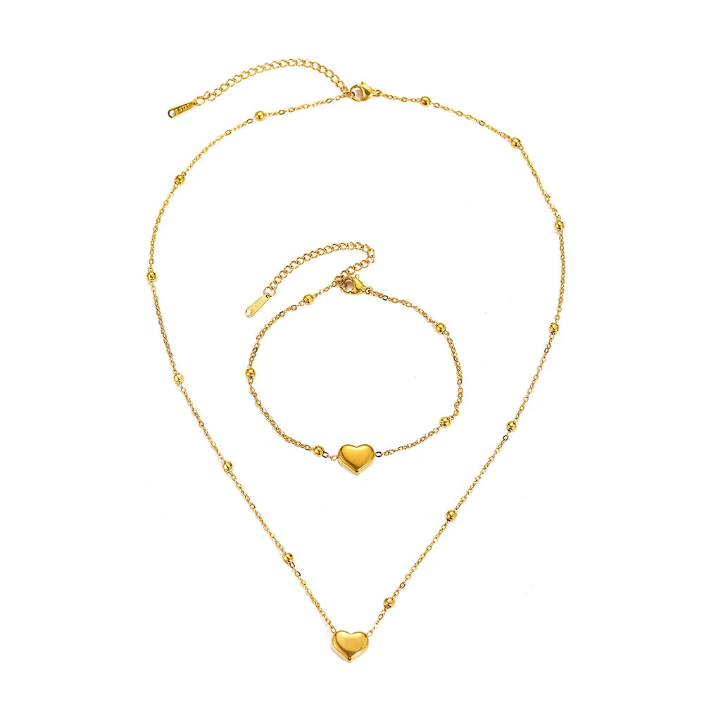 Ensemble de bijoux DOTIFI en acier inoxydable, collier et bracelet avec pendentif cœur stéréoscopique. Bijou simple et tendance, idéal pour les femmes. Cadeau parfait.