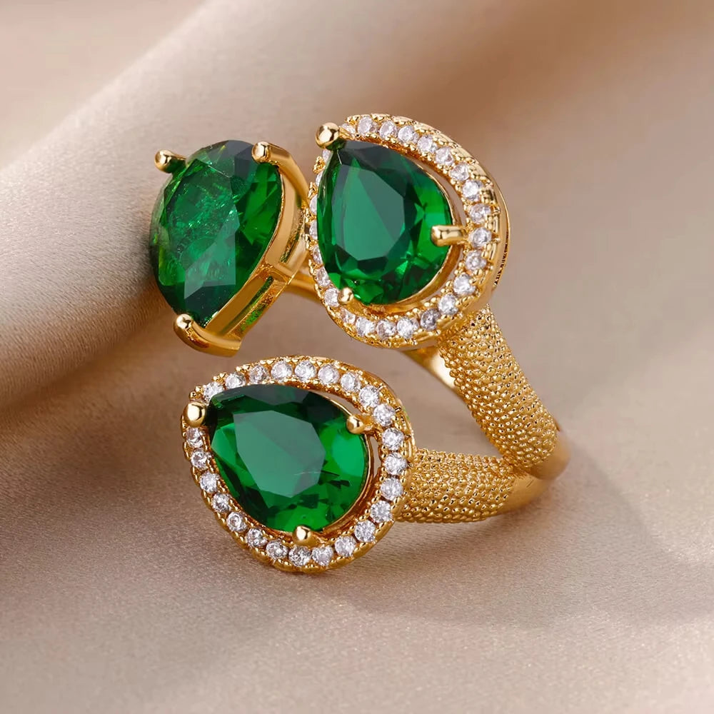 Bague de luxe en acier inoxydable avec zircon vert et fleur pour femme, style serpent, plaquée or, idéale pour un mariage ou une soirée. Bijou d'exception.