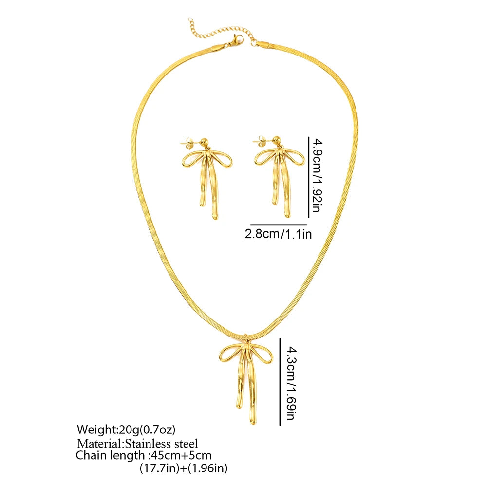Ensemble Aomogo en acier inoxydable, luxueux et tendance, comprenant un pendentif nœud papillon, des boucles d'oreilles et un collier à chaîne en os de serpent. Bijou pour femme à porter au quotidien.