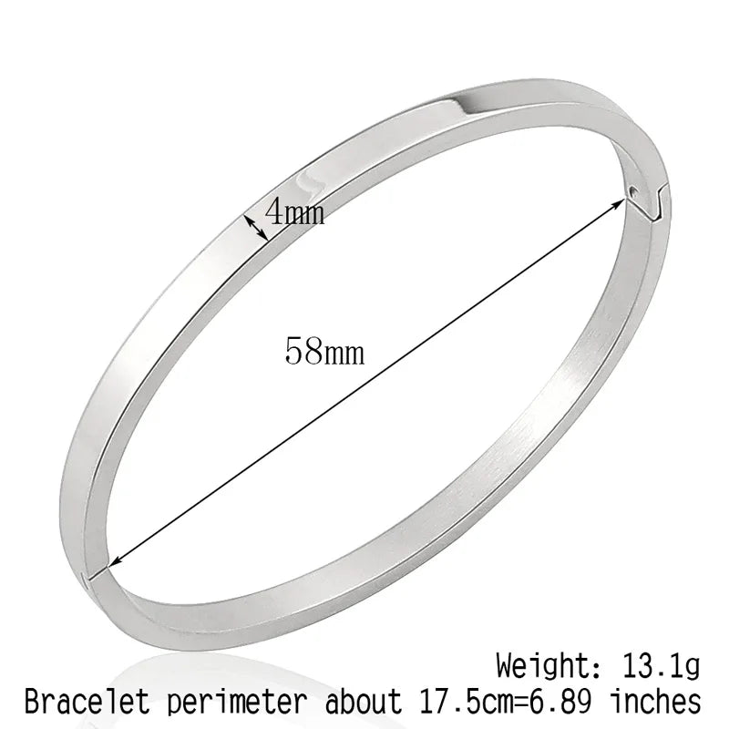 Bracelet jonc ovale tendance en acier inoxydable pour femme et enfant, bijou à breloques, cadeau idéal pour les fêtes, mariages et autres occasions spéciales. Vente en gros.