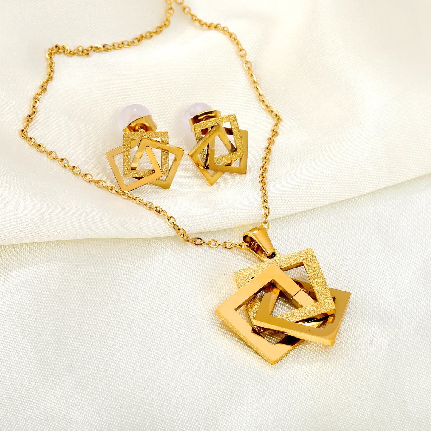 Ensemble de bijoux LUXU KISSKIDS en acier inoxydable doré et étanche, pour femme, accessoire de mariage et de fête : collier et boucles d'oreilles tendance.