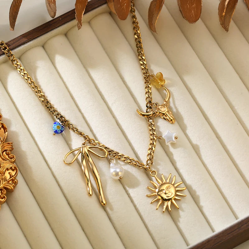 Collier pendentif tendance en acier inoxydable 316L, forme étoile de mer, lune et soleil, avec chaîne dorée. Bijou fantaisie à offrir.