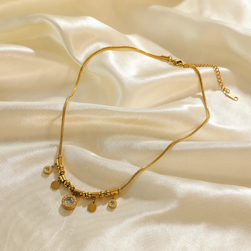 Collier ras du cou EILIECK en acier inoxydable 316L couleur or avec pendentif en perles creuses, inaltérable, idéal pour les cadeaux de fêtes.