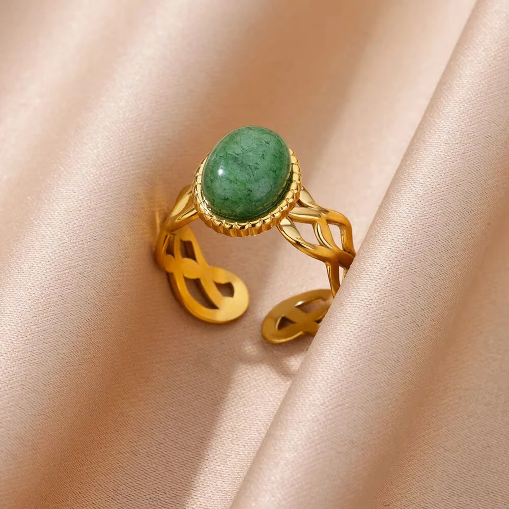 Bague de luxe en acier inoxydable avec zircon vert et fleur pour femme, style serpent, plaquée or, idéale pour un mariage ou une soirée. Bijou d'exception.