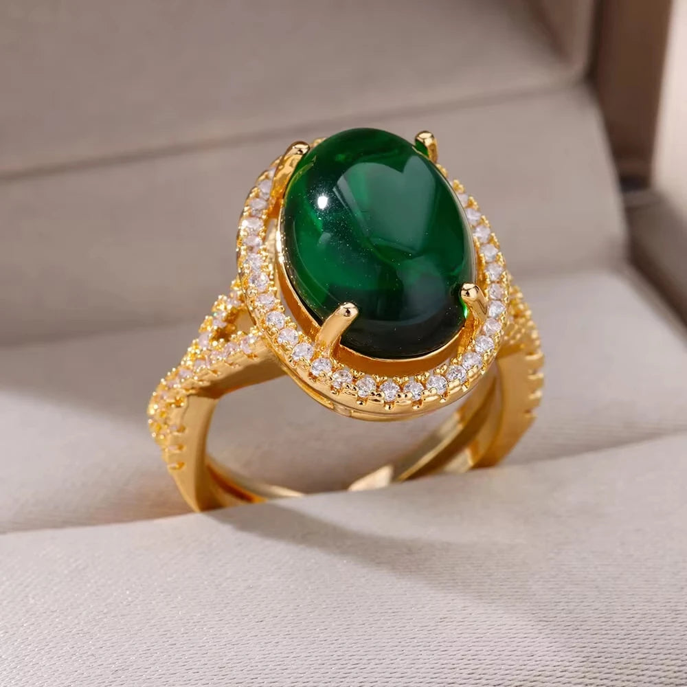 Bague de luxe en acier inoxydable avec zircon vert et fleur pour femme, style serpent, plaquée or, idéale pour un mariage ou une soirée. Bijou d'exception.