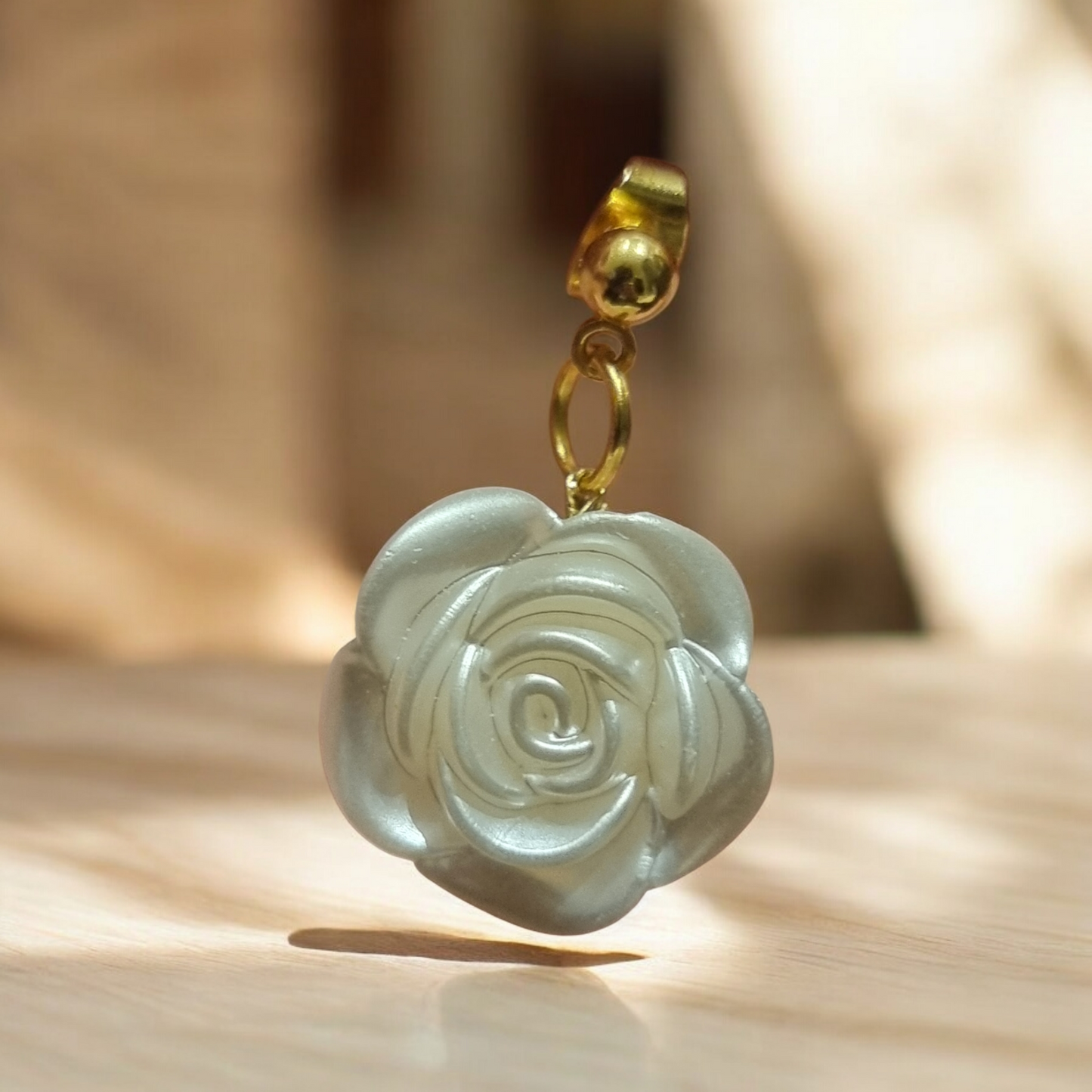 Boucle motif fleural