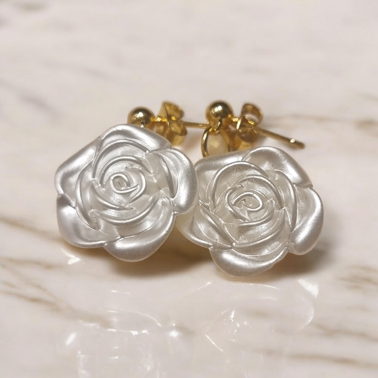 Boucle motif fleural