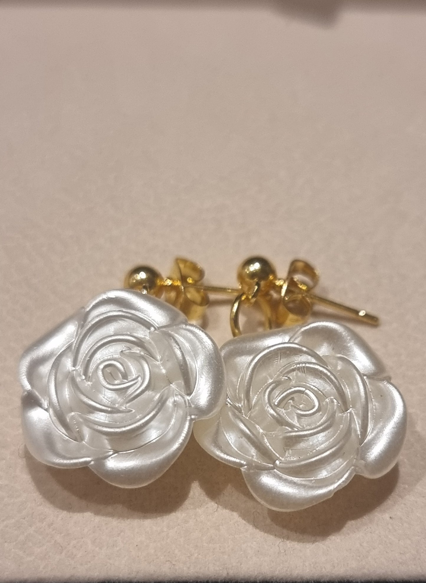 Boucle motif fleural